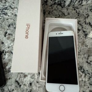 Apple iPhone - pink 8 64gb unlocked - works. Small crack in upper corner